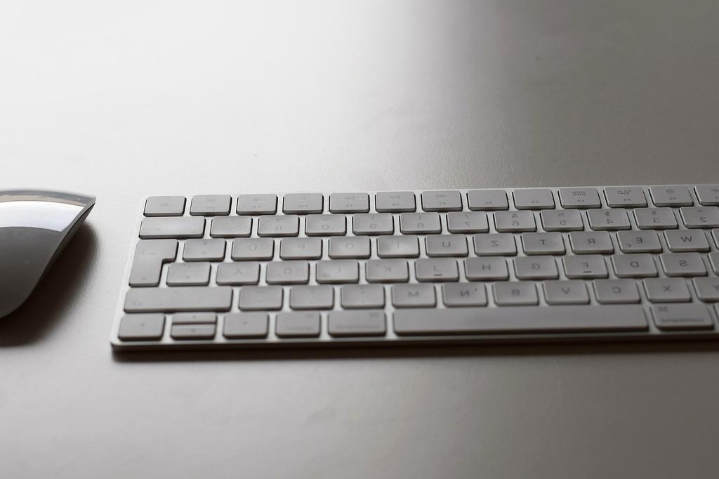 User interacting with multiple online tools displayed on various devices