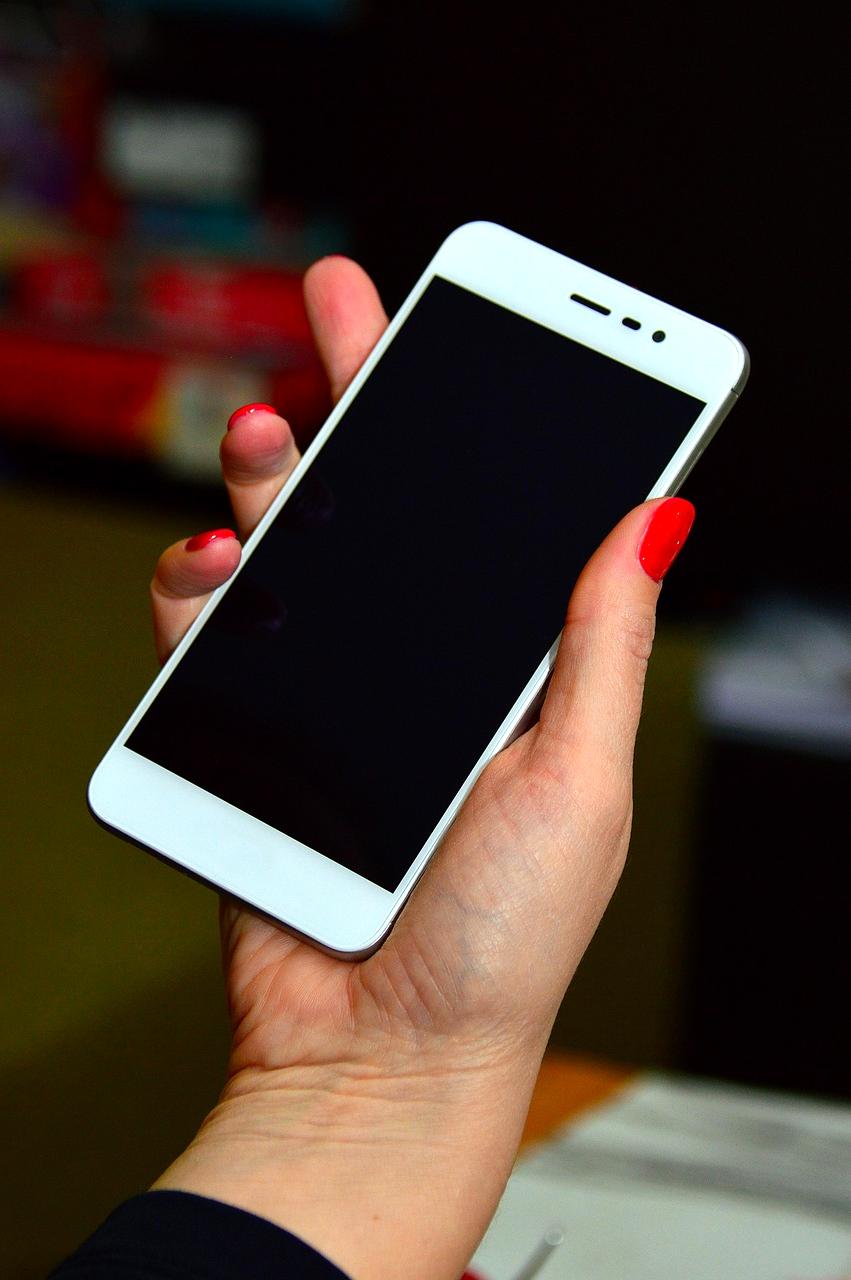 Open laptop displaying various educational websites and online tools